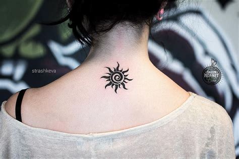 spiral sun tattoo